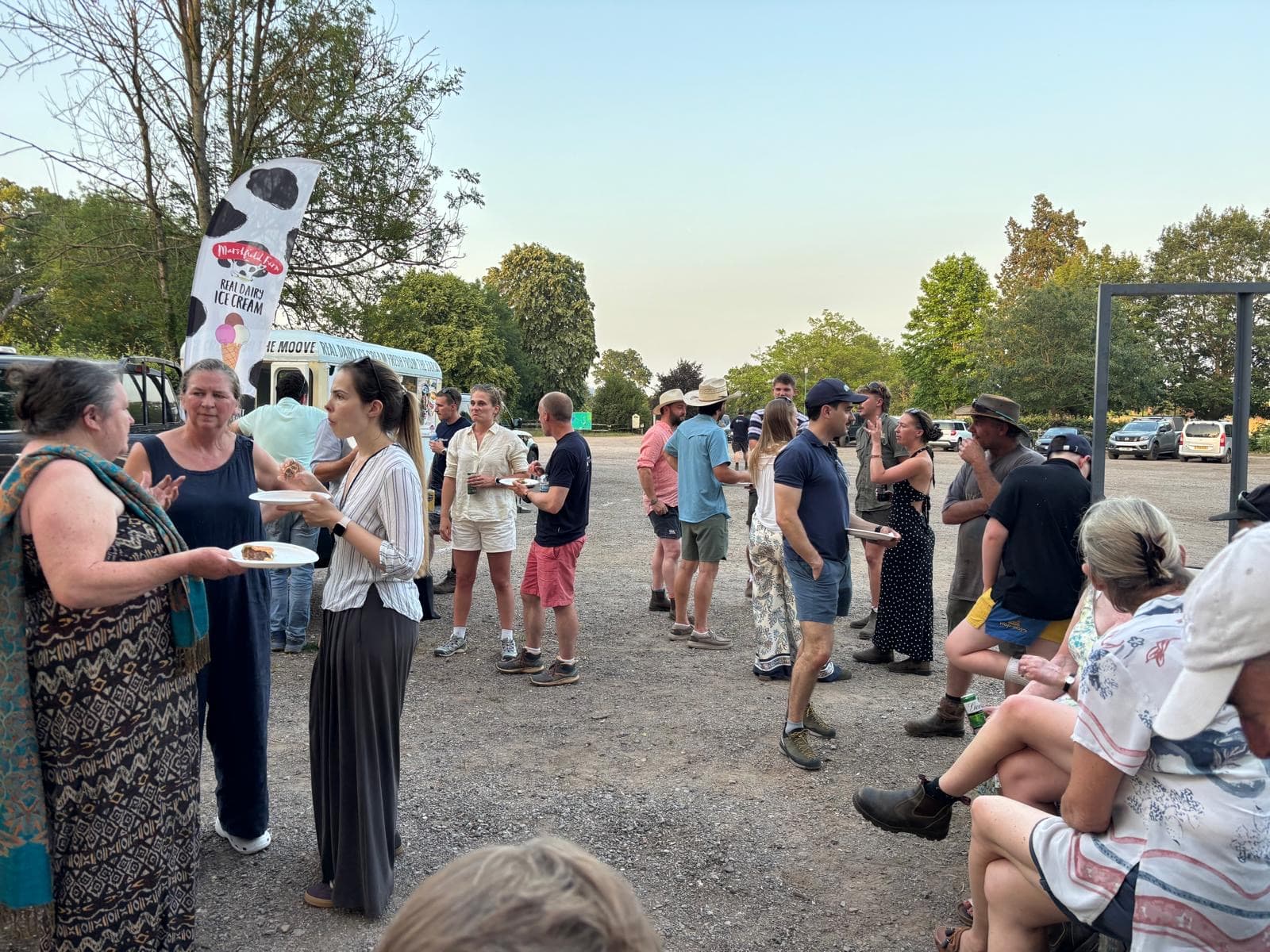 Cluster members socialising after an event